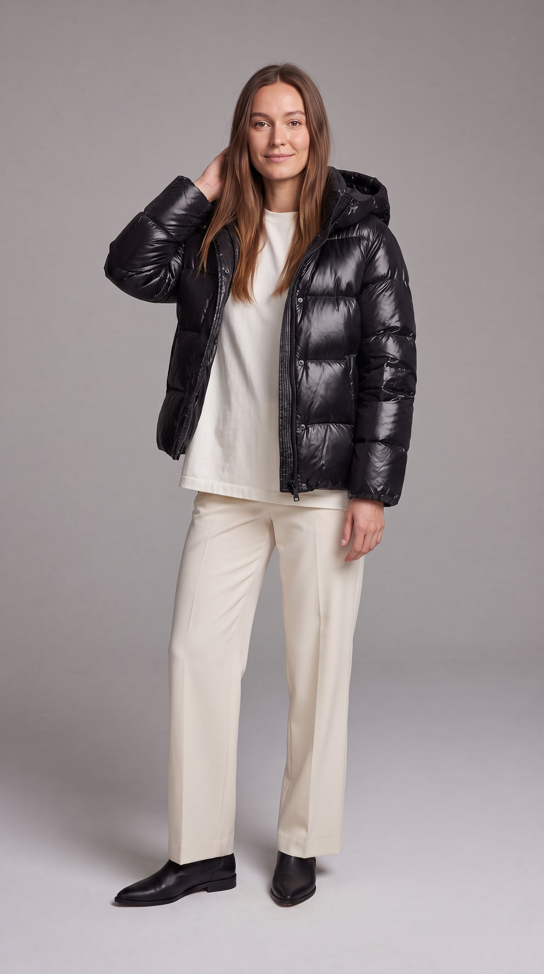 Women's hooded quilted puffer coat with long sleeves and front zipper