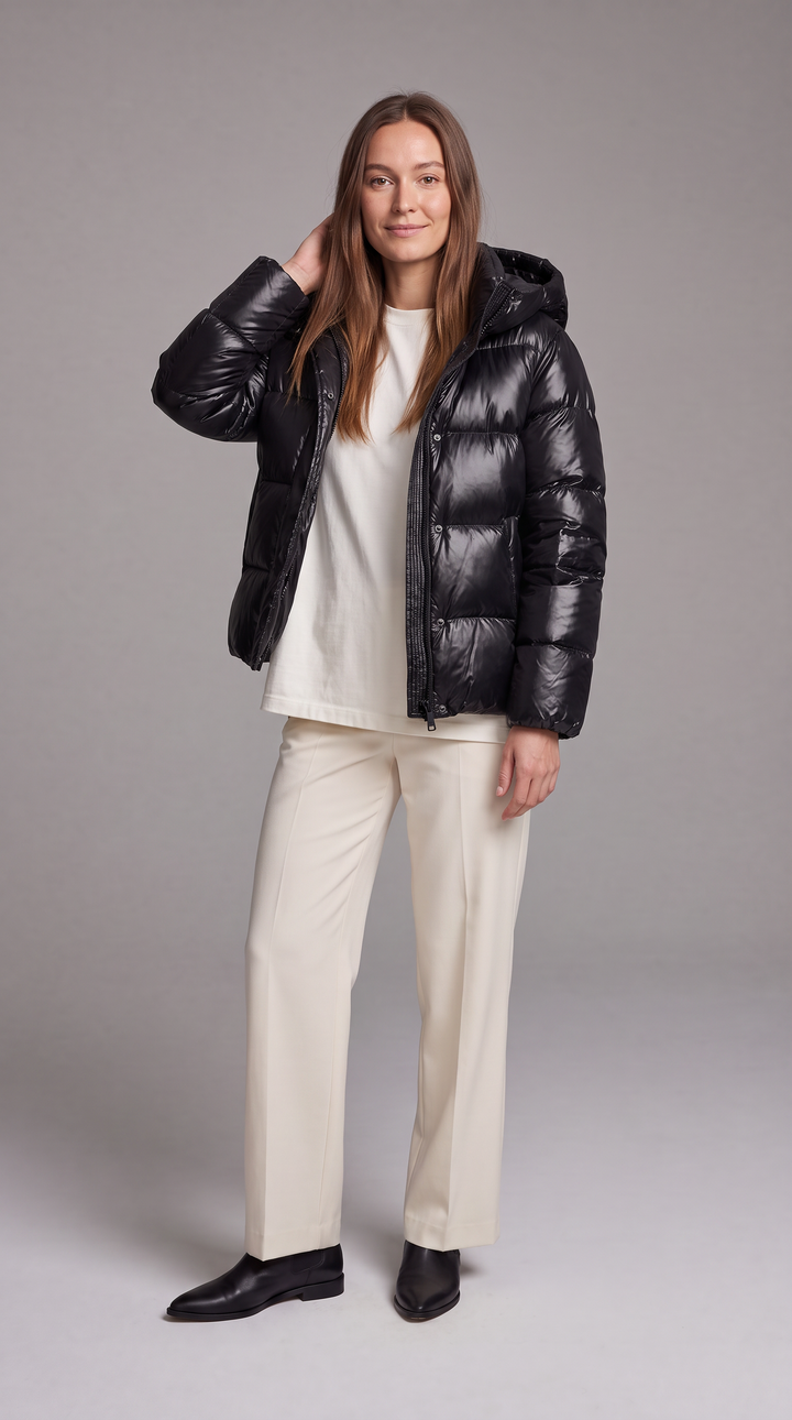 Women's hooded quilted puffer coat with long sleeves and front zipper