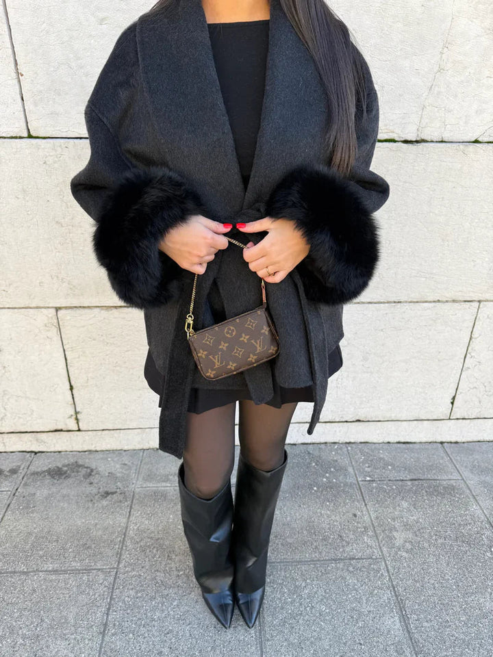 Women's wrap coat with tie belt and fur-trimmed cuffs