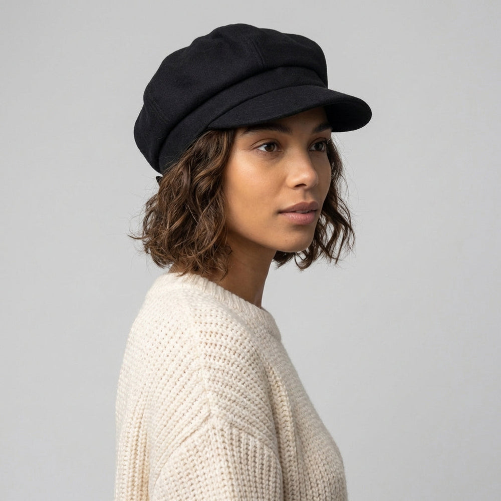 Black women's baker boy hat with rounded panelled crown and short brim