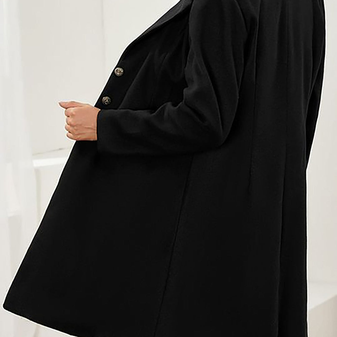 Women's longline tailored coat with notched lapels and button front