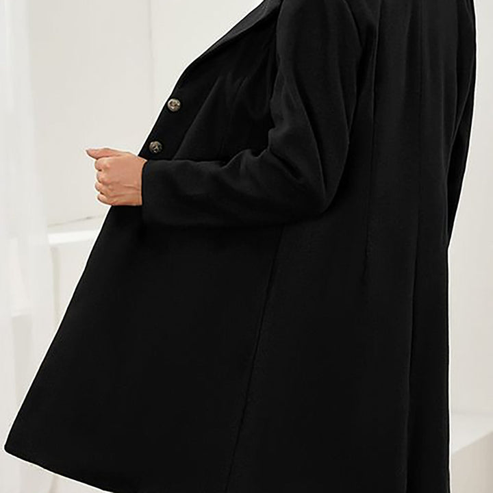 Women's longline tailored coat with notched lapels and button front