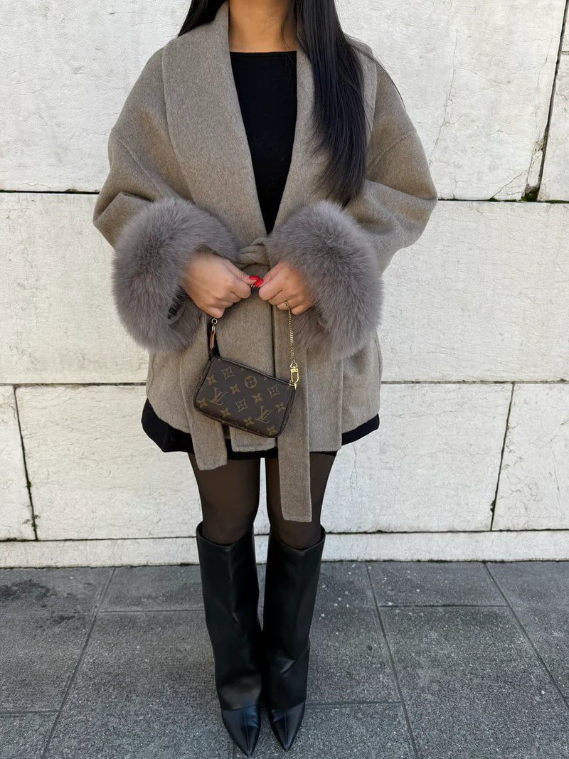 Women's wrap coat with tie belt and fur-trimmed cuffs