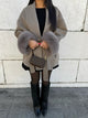 Women's wrap coat with tie belt and fur-trimmed cuffs