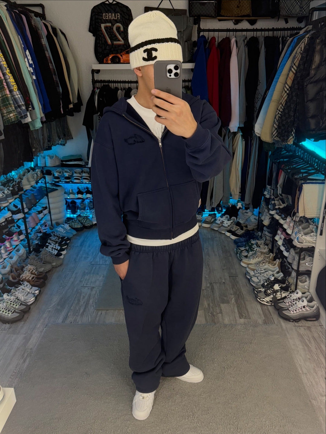 Navy zip hoodie with hood, front pockets and ribbed trims
