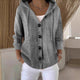 Women's hooded knitted cardigan with long sleeves and button front