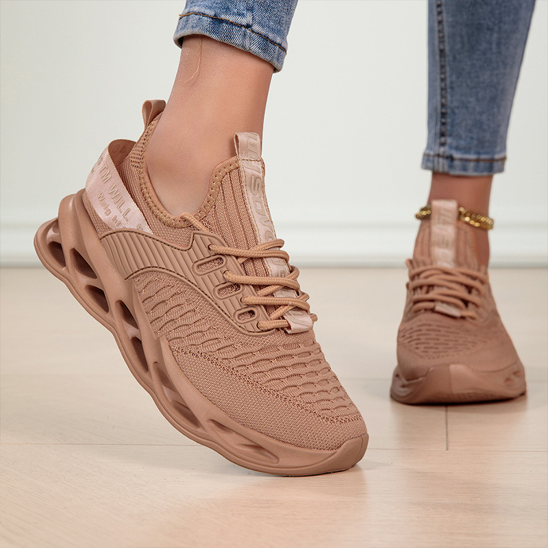Women's multicolor lace-up sneakers with textured uppers and sculpted cut-out soles