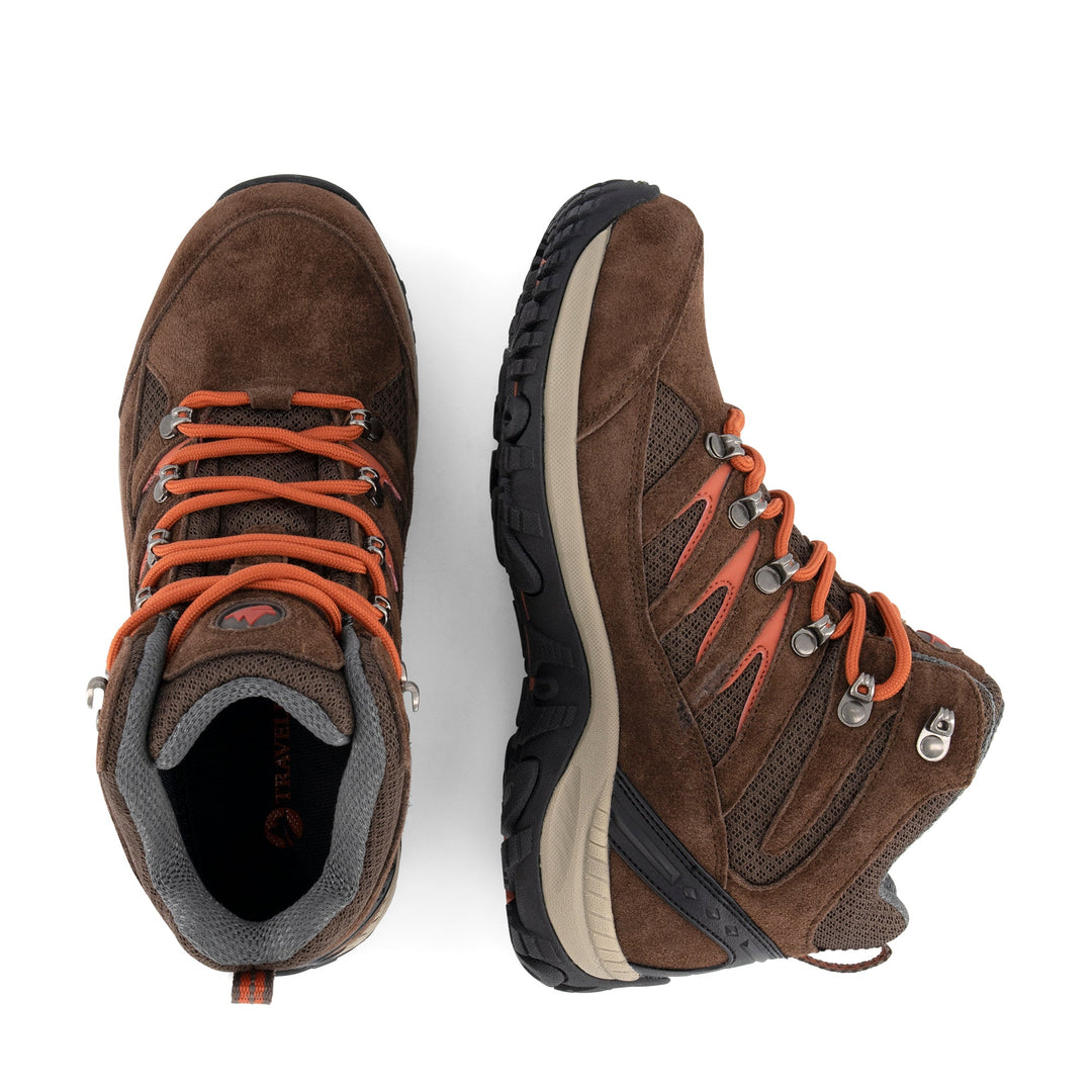 Brown mid-height hiking boots with orange laces and rugged black soles
