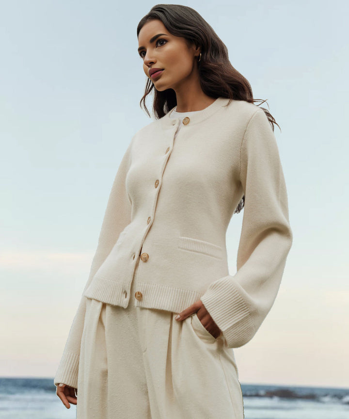 Women's knit cardigan with crew neck, button front, long sleeves and front pockets