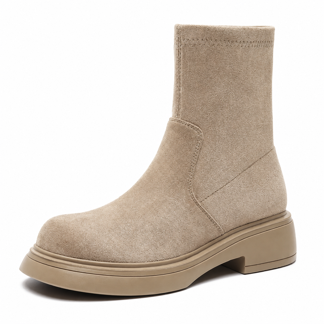 Ankle boots with round toes, low block heels and raised soles