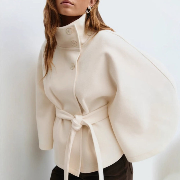 Women's cape coat with high collar, button front and tie waist
