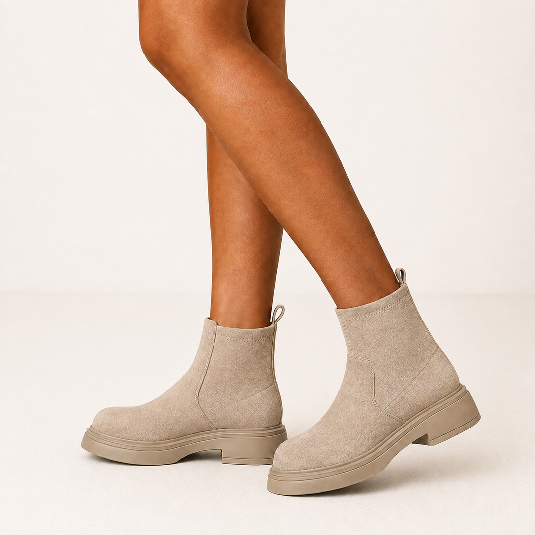 Ankle boots with round toes, low block heels and raised soles