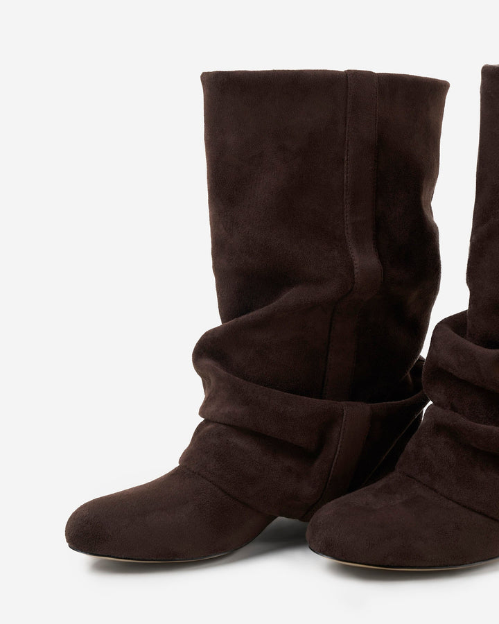 Women's brown slouch knee-high boots with pointed toes and low heels