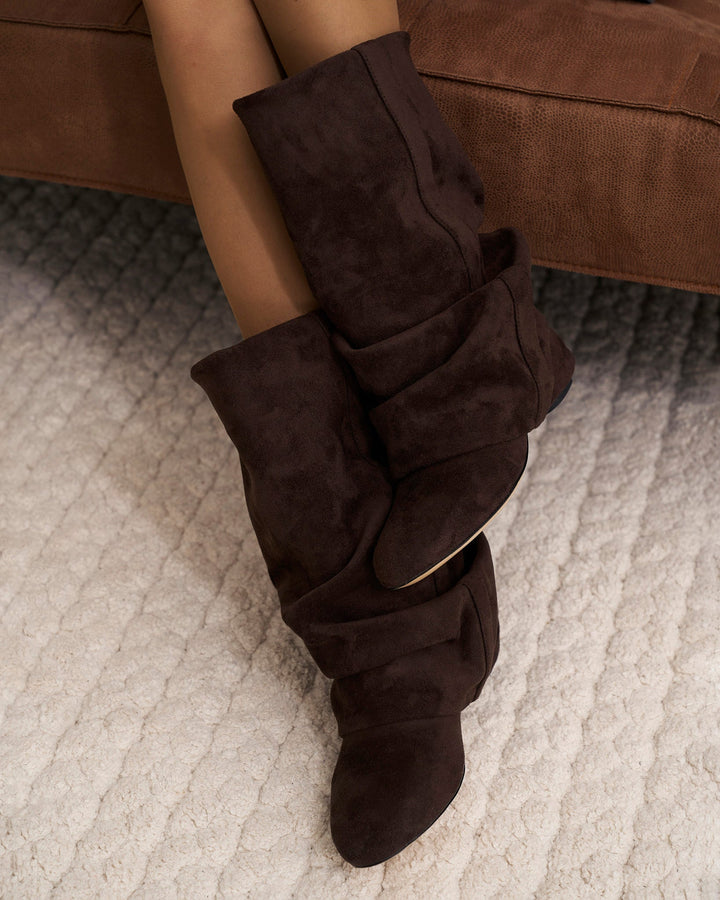 Women's brown slouch knee-high boots with pointed toes and low heels
