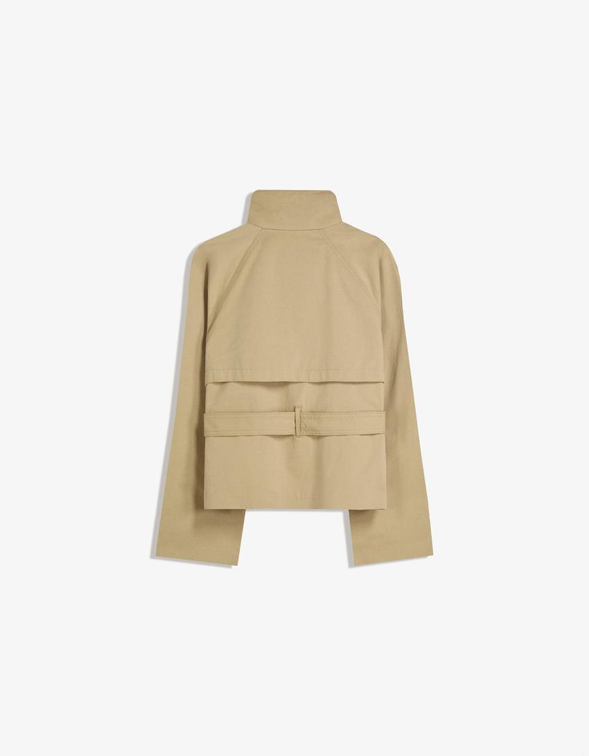 Women's short trench jacket with high collar, buttons, belt and long sleeves