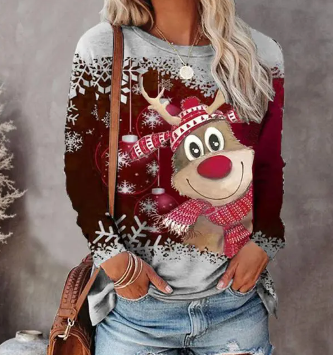 Women's Christmas sweater with reindeer and snowflake graphics
