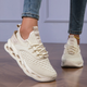 Women's multicolor lace-up sneakers with textured uppers and sculpted cut-out soles