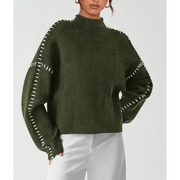 Women's ribbed knit sweater with contrast stitch trim on the sleeves and hem