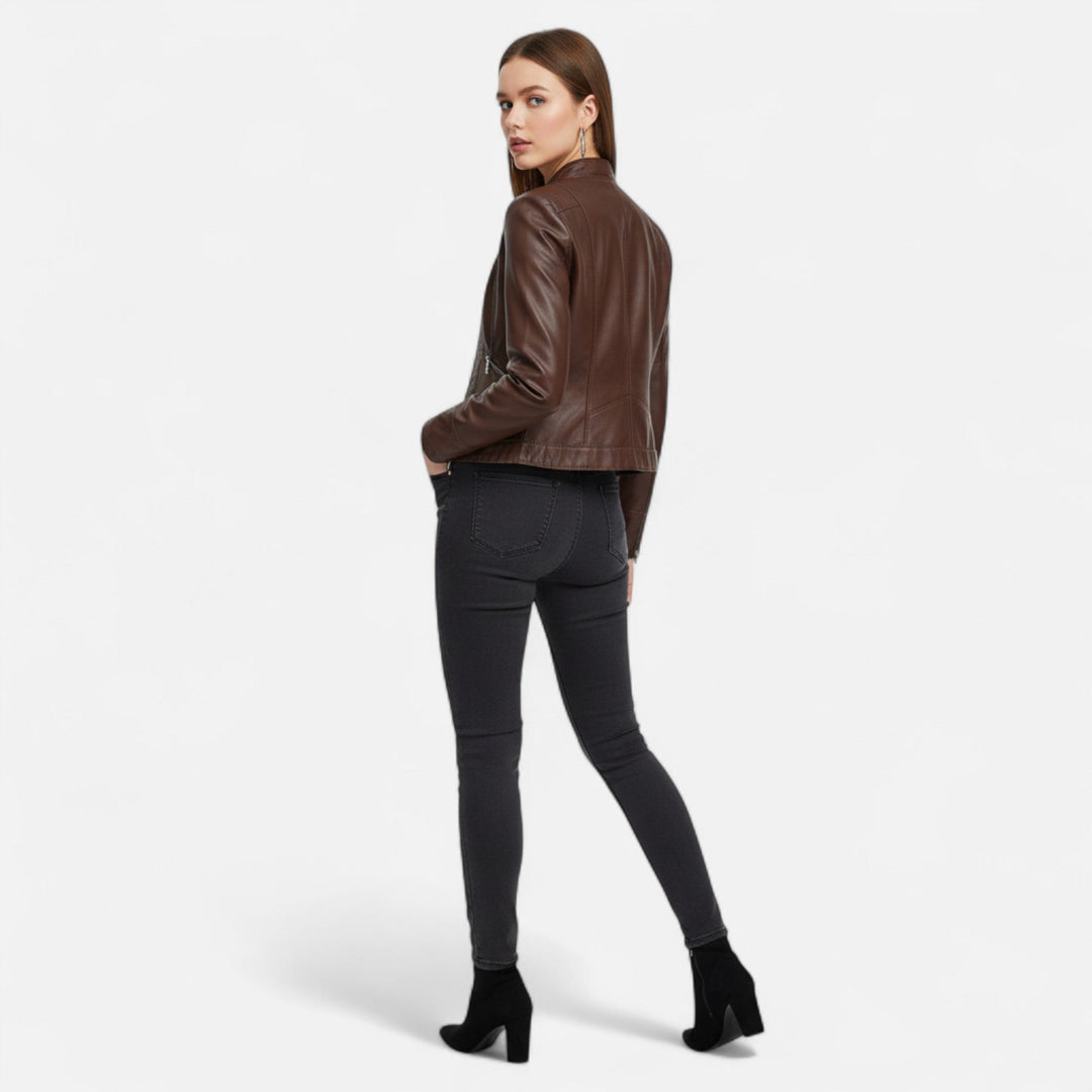 Women's cropped moto jacket with stand collar, long sleeves and zip pockets