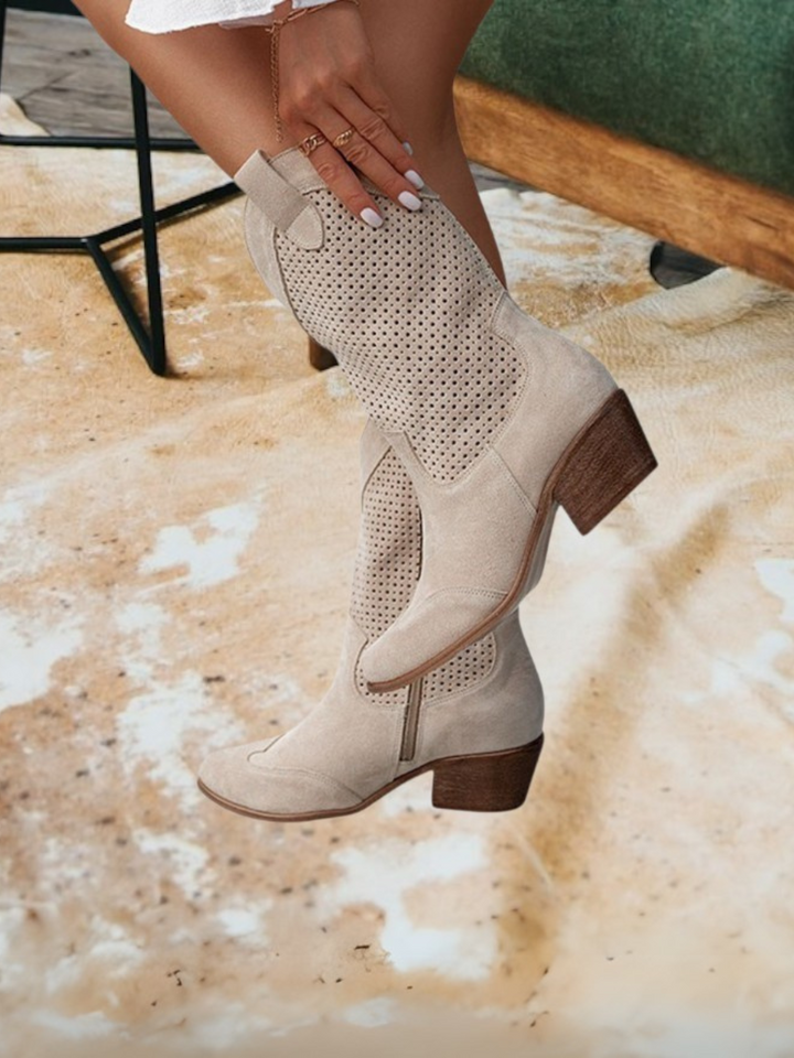 Women's western cowboy boots with pointed toes, perforated panels and low block heels
