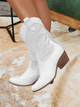 Women's western cowboy boots with pointed toes, perforated panels and low block heels