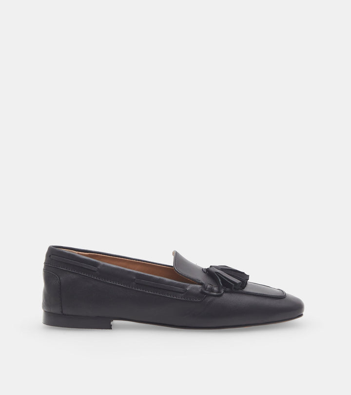 Women's black slip-on loafers with tassel trim and low heel