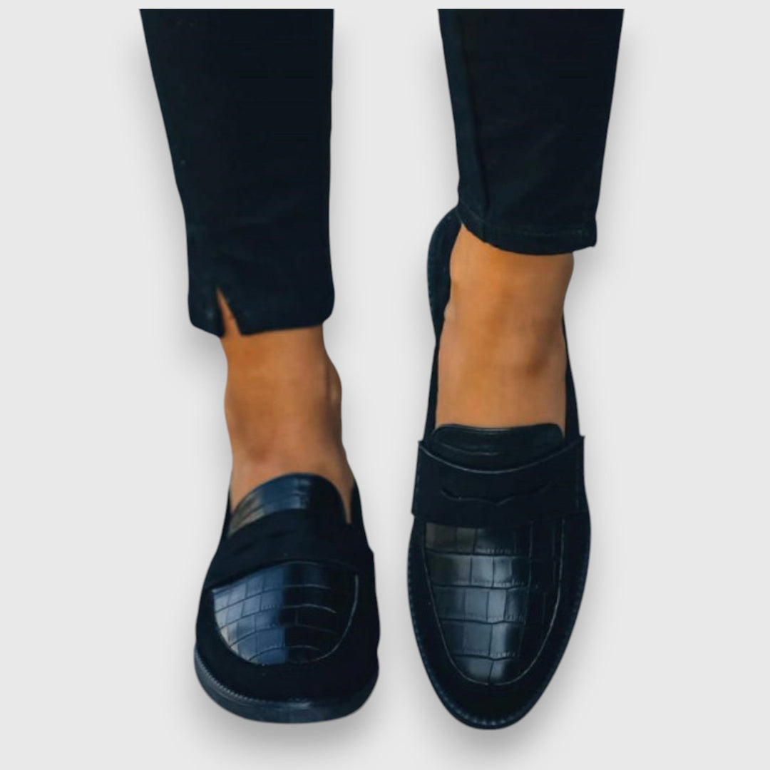 Black women's loafers with crocodile-embossed vamp and penny strap