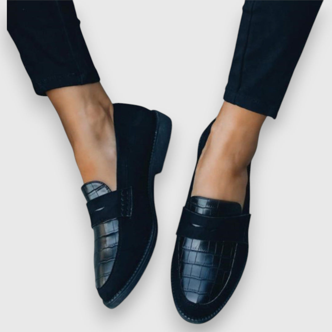 Black women's loafers with crocodile-embossed vamp and penny strap