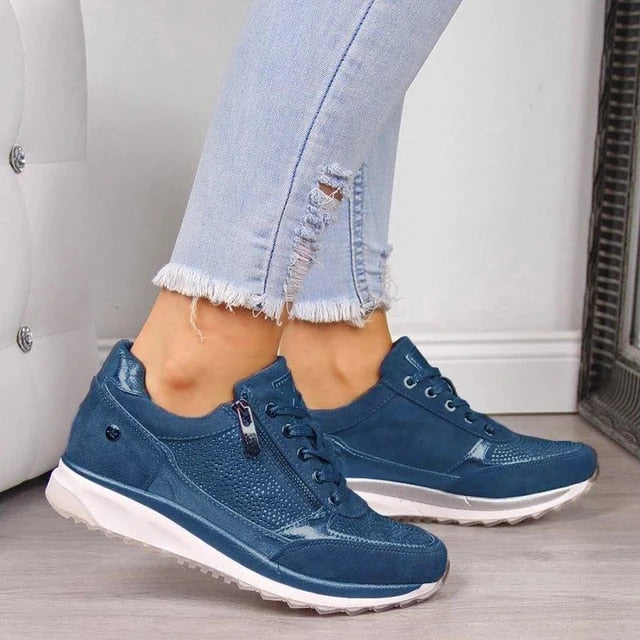 Women's low-top sneakers with laces, side zip and contrast sole