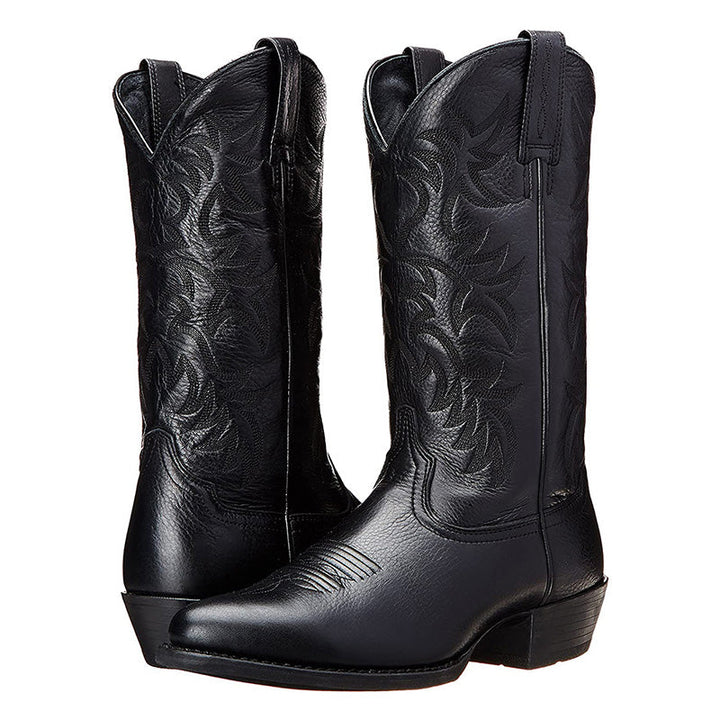 Tall embroidered cowboy boots with pointed toes and low heels