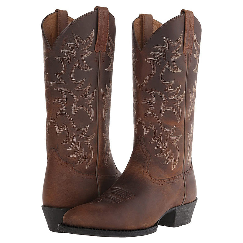 Tall embroidered cowboy boots with pointed toes and low heels