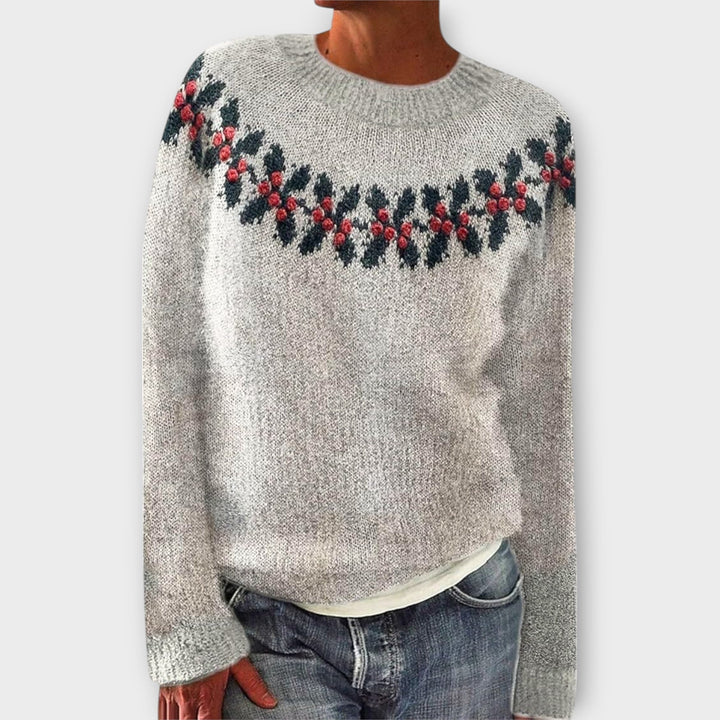 Women's Christmas jumper with crew neck, long sleeves and festive reindeer or holly pattern