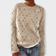 Women's Christmas jumper with crew neck, long sleeves and festive reindeer or holly pattern
