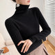 Women's ribbed turtleneck sweater with long sleeves and fitted hip-length cut