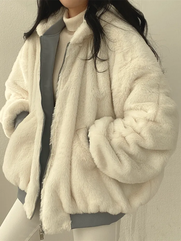 Women's relaxed bomber jacket with sherpa-style lining, zip front and flap pockets