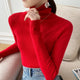 Women's ribbed turtleneck sweater with long sleeves and fitted hip-length cut