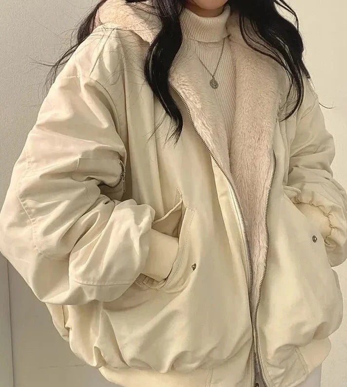 Women's relaxed bomber jacket with sherpa-style lining, zip front and flap pockets