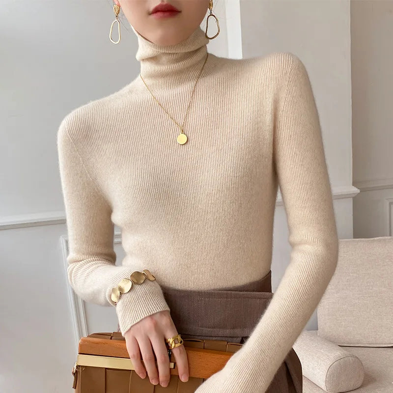 Women's ribbed turtleneck sweater with long sleeves and fitted hip-length cut