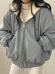 Women's relaxed bomber jacket with sherpa-style lining, zip front and flap pockets
