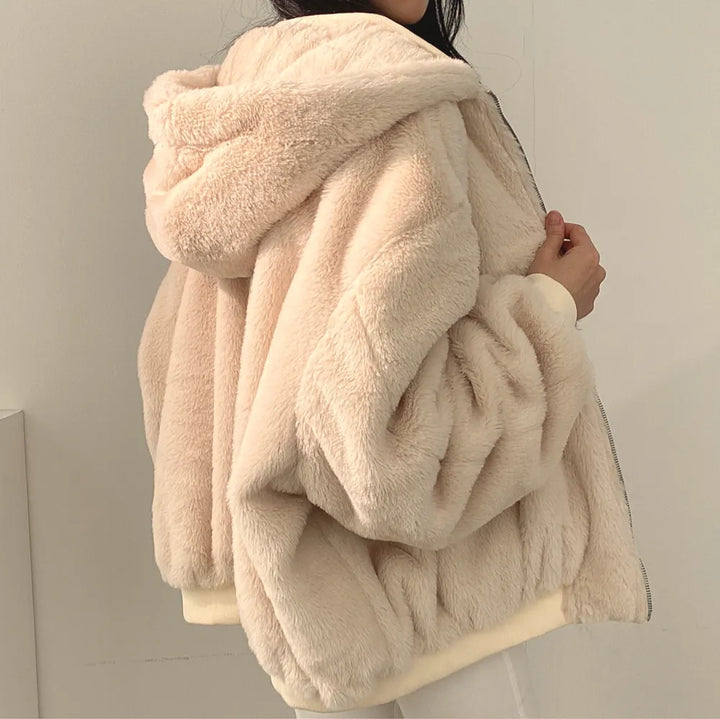 Women's relaxed bomber jacket with sherpa-style lining, zip front and flap pockets