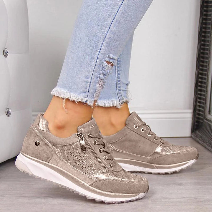 Women's low-top sneakers with laces, side zip and contrast sole
