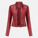 Women's cropped moto jacket with stand collar, long sleeves and zip pockets