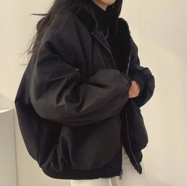 Women's relaxed bomber jacket with sherpa-style lining, zip front and flap pockets