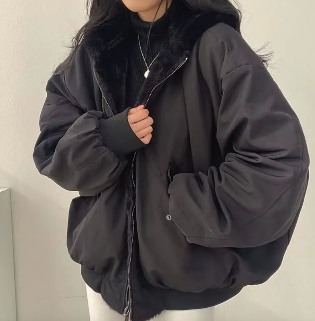 Women's relaxed bomber jacket with sherpa-style lining, zip front and flap pockets