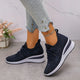 Women's textured lace-up sneakers with layered flat soles