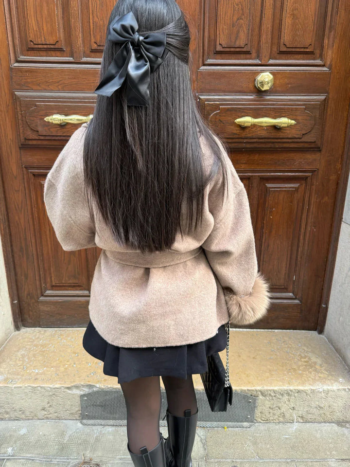Women's wrap coat with tie belt and fur-trimmed cuffs