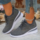 Women's textured lace-up sneakers with layered flat soles