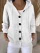 Women's hooded knitted cardigan with long sleeves and button front