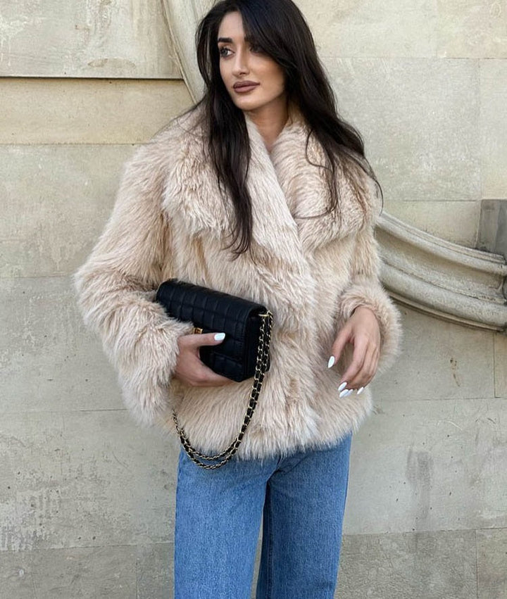 Women's beige faux fur jacket with wide collar and long sleeves