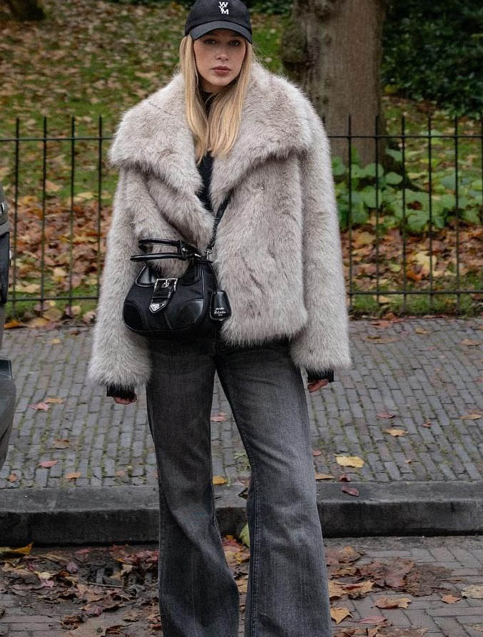 Women's beige faux fur jacket with wide collar and long sleeves